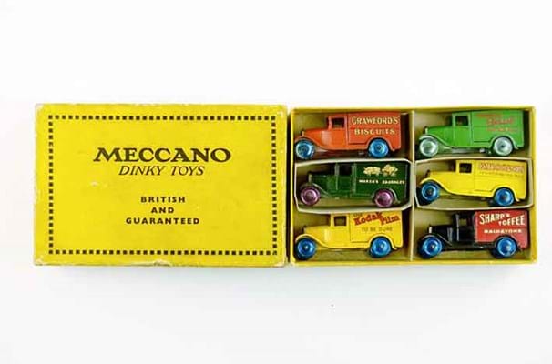 Six Dinky Toy Cars in a Meccano box with lid