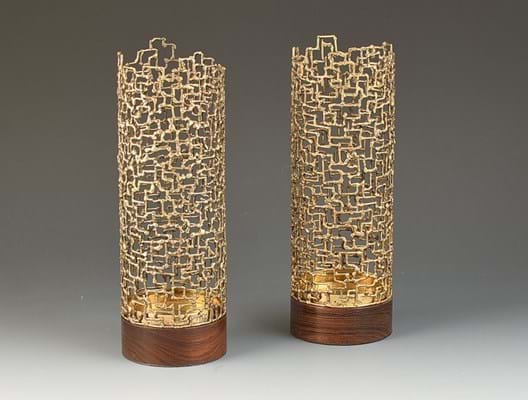 Pair of mesh, golden, tubular candlesticks