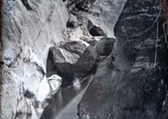 Waterfall emerging from sheer rock, c.1854