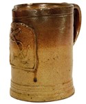 An 18th century stoneware jug takes 40 times top estimate at Sworders