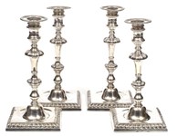 Silver candlesticks relight the auction fire