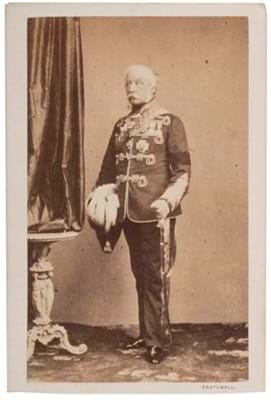 An important military man with campaign medals on his chest and order of the garter.jpg