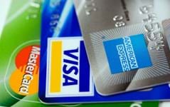 Regional firms weigh costs of credit card fees