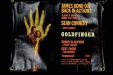 Auctioneer shows a golden James Bond poster touch