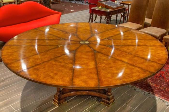 replica of a Robert Jupe circular mahogany dining table