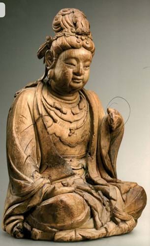 A fine and rare pair of carved wood figures of seated bodhisattvas Song Dynasty.jpg