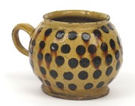 Rarities in the regions – three lots drawing strong bidding including a Staffordshire slipware honey pot