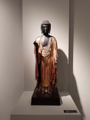 A wood sculpture of the Buddah from the early Edo period