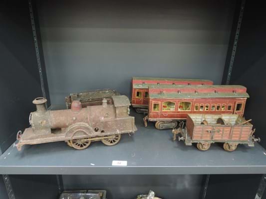 Rusty damaged train set found in garage sells for 6500 at 1818 Auctioneers.jpg