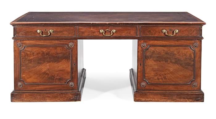 A George II mahogany partners' desk In the manner of Thomas Chippendale.jpg