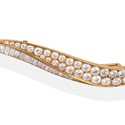 A diamond 'Flamme' brooch by Van Cleef and Arpels 