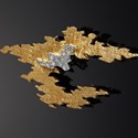Diamond cloud brooch in 18ct two colour gold by Andrew Grima