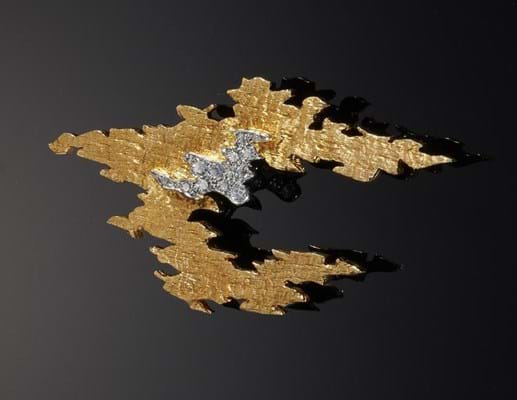 Diamond cloud brooch in 18ct two colour gold by Andrew Grima