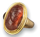 Four cameo and intaglio rings indicating glyphic art is now at the cutting edge of fashion