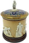 Doulton Lambeth frogs and cricketers make for a lively sale