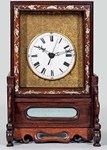 Chinese table clock combining Western and Oriental features offered at Hanover sale