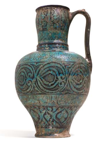 Kashan turquoise glazed pottery pitcher
