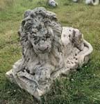 Statues surface from sunken garden site after decades in the undergrowth