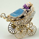 Sales push: miniature pram and doll among the Kent stand-out lots