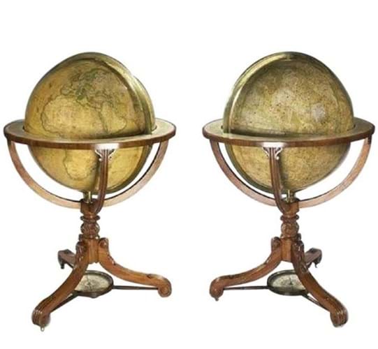 A pair of Newton globes