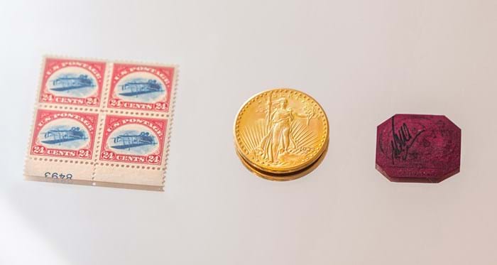 Stuart Weitzman coin and stamp