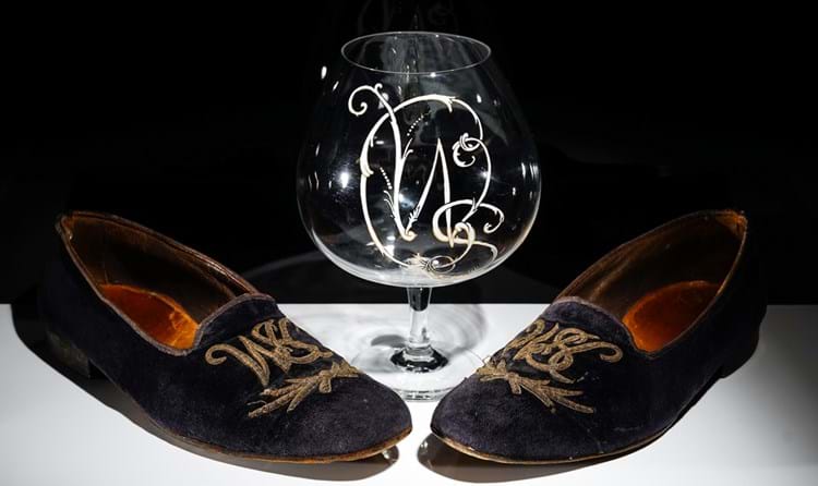 Churchill's evening slippers and glass