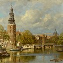 Montelbaanstoren on the bank of the Oudeschans canal in Amsterdam
