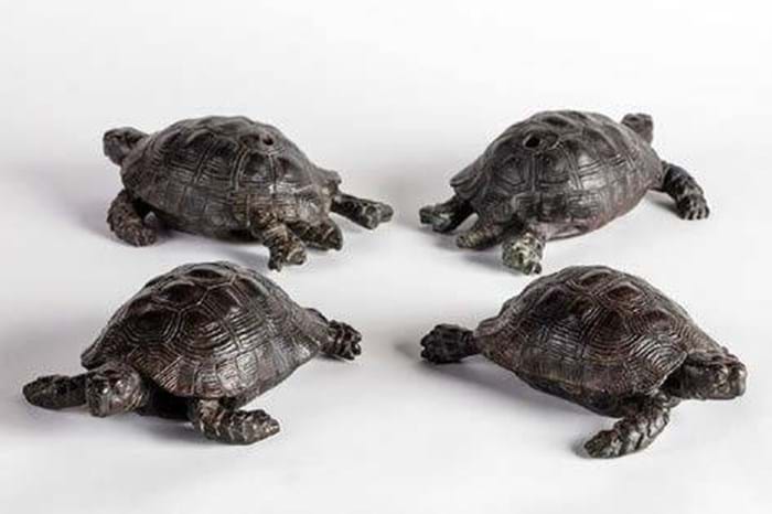 Four bronze tortoises