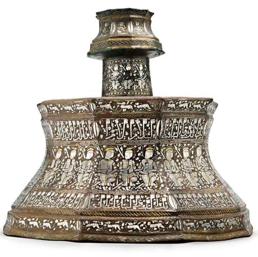 Ilkhanid gold and silver-inlaid brass candlestick
