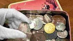 ‘Sweet tin’ silver shilling brings £220,000
