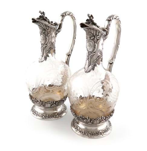 French silver-mounted glass claret jugs