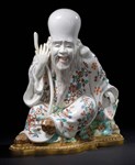 Seated figure of Chinese deity creates new top price for Chantilly porcelain at auction
