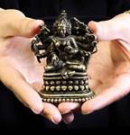 A Buddha in the hand at 350-times estimate