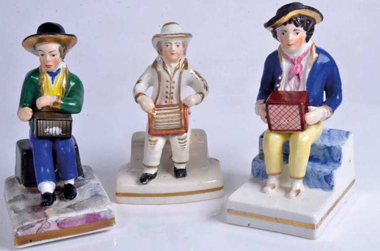 Three versions of the Staffordshire figure The Italian Boy