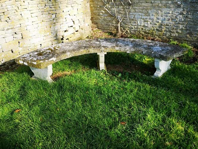 Portland stone curved bench